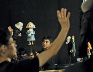 Pedro Reyes, Karl Marx, Adam Smith and puppeteers from the making of the Baby Marx pilot, 2009. Courtesy Detalle Films.  
